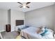 Serene bedroom with a king-size bed and a modern TV stand at 2225 Pleasant Hill Rd, Atlanta, GA 30349