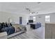Bright bedroom featuring a king-size bed and a relaxing sitting area at 2225 Pleasant Hill Rd, Atlanta, GA 30349