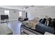 Spacious bedroom with large bed, sitting area, and plenty of natural light at 2225 Pleasant Hill Rd, Atlanta, GA 30349