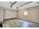Spacious garage with light gray walls and vinyl wood flooring at 2225 Pleasant Hill Rd, Atlanta, GA 30349