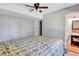 Serene bedroom with a king-size bed and adjacent bathroom access at 2225 Pleasant Hill Rd, Atlanta, GA 30349