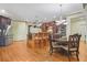 Spacious kitchen with island, stainless steel appliances, and hardwood floors at 1565 Mountain Shadow Trl, Stone Mountain, GA 30087