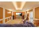Home theater with large screen, built in cabinetry, and comfortable seating at 1565 Mountain Shadow Trl, Stone Mountain, GA 30087