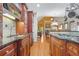 Spacious kitchen with granite countertops, custom cabinetry, and breakfast bar at 1565 Mountain Shadow Trl, Stone Mountain, GA 30087