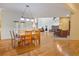 Dining room with hardwood floors and a large table at 1565 Mountain Shadow Trl, Stone Mountain, GA 30087