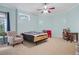 Bedroom with window seat, TV, and adjustable bed at 1565 Mountain Shadow Trl, Stone Mountain, GA 30087