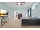 Light and airy bedroom with large TV and comfortable bed at 1565 Mountain Shadow Trl, Stone Mountain, GA 30087