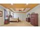 Bright main bedroom with coffered ceiling, hardwood floors, and plenty of closet space at 1565 Mountain Shadow Trl, Stone Mountain, GA 30087
