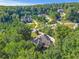 Community of luxury homes situated in a wooded area at 1565 Mountain Shadow Trl, Stone Mountain, GA 30087