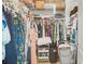 Spacious walk-in closet with ample shelving and hanging space at 1565 Mountain Shadow Trl, Stone Mountain, GA 30087