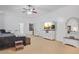 Main bedroom with large TV, dresser, and plenty of space at 1565 Mountain Shadow Trl, Stone Mountain, GA 30087