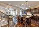 Modern kitchen with island and hardwood floors at 3517 Village Park Nw Way, Kennesaw, GA 30144