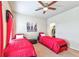 Bedroom with two twin beds and a ceiling fan at 3517 Village Park Nw Way, Kennesaw, GA 30144