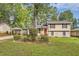 House exterior with carport and landscaped yard at 139 Old Mill Sw Trl, Conyers, GA 30094