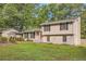 House exterior with carport and landscaped yard at 139 Old Mill Sw Trl, Conyers, GA 30094
