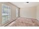 Bright bedroom with neutral walls and carpet at 139 Old Mill Sw Trl, Conyers, GA 30094