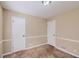 Simple bedroom with neutral walls and carpet flooring at 139 Old Mill Sw Trl, Conyers, GA 30094