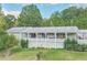 Ranch style home with large covered porch and spacious yard at 4310 Bryan Se Ln, Acworth, GA 30102