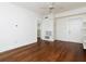 Spacious bedroom with hardwood floors, ceiling fan and built-in shelving at 242 12Th Ne St # 8, Atlanta, GA 30309