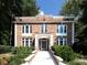 Brick building with a classic design and landscaping at 242 12Th Ne St # 8, Atlanta, GA 30309