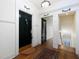 Second floor hallway with dark hardwood floors and unique light fixture at 242 12Th Ne St # 8, Atlanta, GA 30309