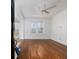 Spacious living room with hardwood floors and ceiling fan at 242 12Th Ne St # 8, Atlanta, GA 30309