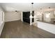 Open concept living and kitchen area with dark hardwood floors at 662 Gary Nw Rd, Atlanta, GA 30318