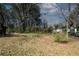 Large backyard with mature trees and open space at 662 Gary Nw Rd, Atlanta, GA 30318