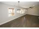 Open living room with hardwood floors and lots of natural light at 662 Gary Nw Rd, Atlanta, GA 30318