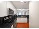 Modern kitchen with granite countertops and stainless steel appliances at 230 E Ponce De Leon Ave # 314, Decatur, GA 30030