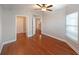 Bright bedroom with hardwood floors and access to hallway at 230 E Ponce De Leon Ave # 314, Decatur, GA 30030
