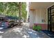 Sidewalk view of building exterior and parked cars at 230 E Ponce De Leon Ave # 314, Decatur, GA 30030