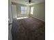 Spacious bedroom with carpeting, ceiling fan, and windows at 2977 Cascade Manor Dr, Decatur, GA 30034