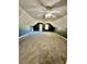 Large bonus room with carpet, ceiling fan, and window at 2735 Sandy Creek Cir, Loganville, GA 30052