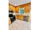 Kitchen with granite countertops and stainless steel appliances at 2735 Sandy Creek Cir, Loganville, GA 30052