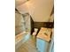Clean bathroom with a tub, shower, toilet and vanity at 2735 Sandy Creek Cir, Loganville, GA 30052