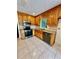 Kitchen with granite countertops and stainless steel appliances at 2735 Sandy Creek Cir, Loganville, GA 30052