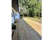 Large deck with wooden planks, offering a relaxing outdoor space at 2735 Sandy Creek Cir, Loganville, GA 30052