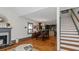 Open concept dining room with hardwood floors and view of kitchen at 1688 Richland Sw Rd, Atlanta, GA 30311