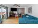 Comfortable living room features a sectional sofa and a large flat-screen TV at 1688 Richland Sw Rd, Atlanta, GA 30311