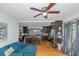 Cozy living room with teal sectional sofa and view into the kitchen at 1688 Richland Sw Rd, Atlanta, GA 30311