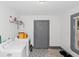 Convenient laundry room with washer, dryer, and extra storage at 1688 Richland Sw Rd, Atlanta, GA 30311