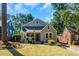 Charming gray house with red door and yard at 1688 Richland Sw Rd, Atlanta, GA 30311