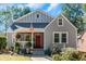 Gray house with red door and landscaped yard at 1688 Richland Sw Rd, Atlanta, GA 30311