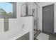 Bathroom with soaking tub and walk-in shower at 1688 Richland Sw Rd, Atlanta, GA 30311