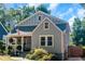 Quaint gray house with red door and yard at 1688 Richland Sw Rd, Atlanta, GA 30311