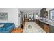 Modern kitchen with granite island, dark cabinetry, and stainless steel appliances at 1688 Richland Sw Rd, Atlanta, GA 30311