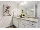 Bathroom with double vanity, granite countertop, and walk-in shower at 127 Stanchion Dr, Union City, GA 30291