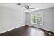 Bright bedroom with hardwood floors and a large window at 4385 Wieuca Ne Rd, Atlanta, GA 30342