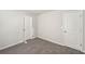 Spacious bedroom with double door closet and carpet at 11820 Rizvan Pl, Covington, GA 30014
